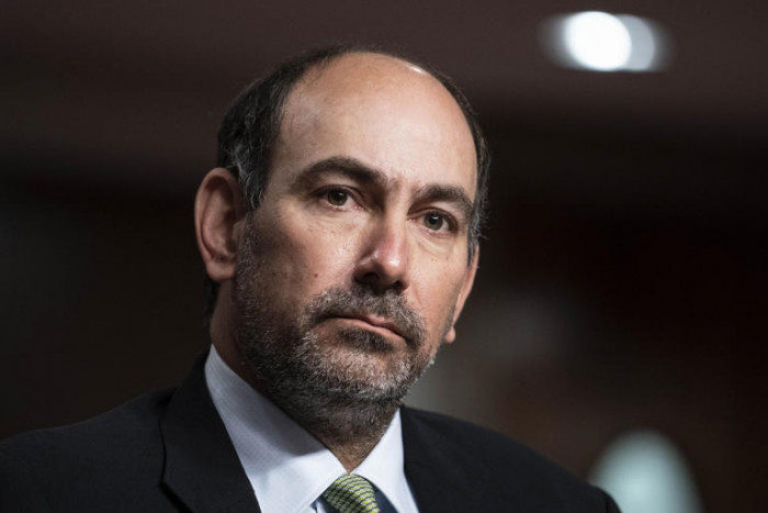 Singapurs Minister tritt nach vernichtendem Bericht für US-Gesandten ein